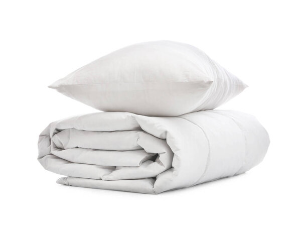 Soft blanket with pillow on white background