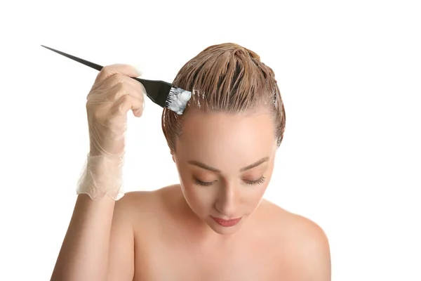 Young Woman Applying Dye Hairs White Background — Stock Photo, Image