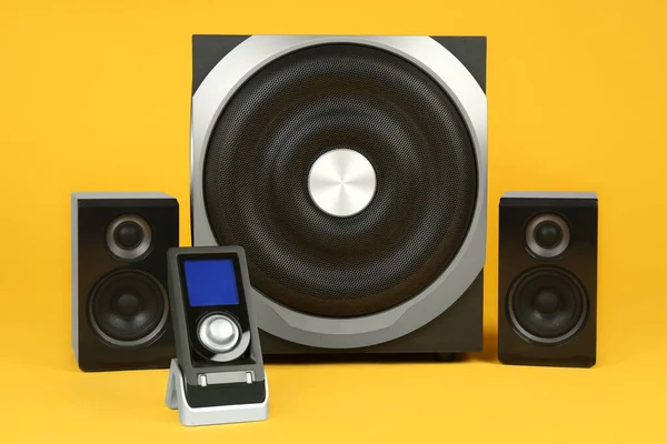 Modern Powerful Audio Speaker System Remote Yellow Background — Stock Photo, Image