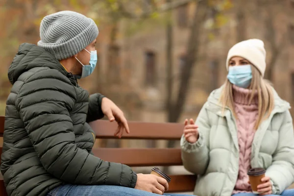 People Medical Masks Keeping Distance While Talking Outdoors Protective Measures — Stock Photo, Image