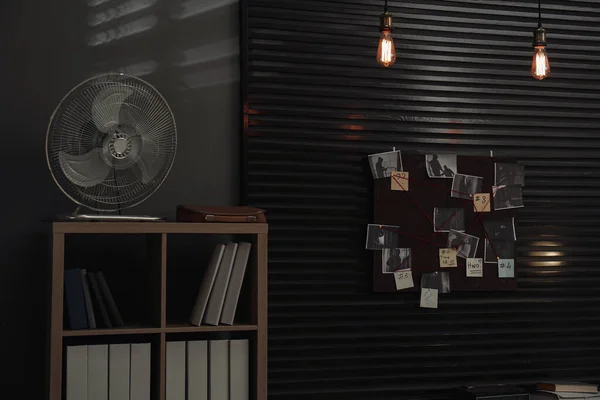 Detective office interior with evidence board on wall