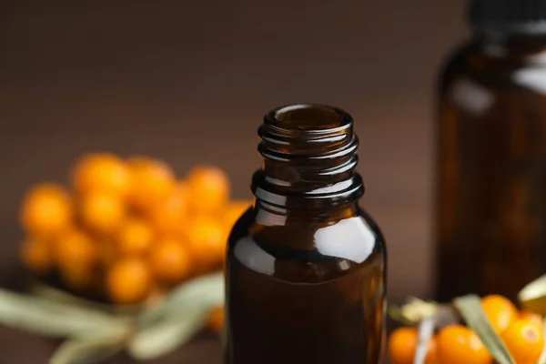 Natural Sea Buckthorn Oil Bottle Blurred Background Closeup — Stock Photo, Image