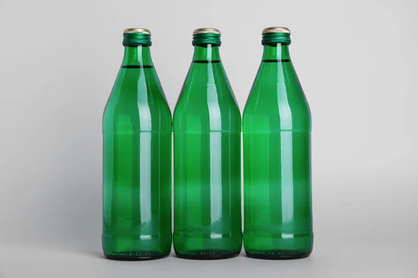 Glass Bottles Water White Background — Stock Photo, Image