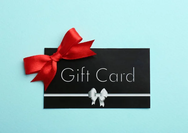 Gift Card Bow Light Blue Background Top View — Stock Photo, Image