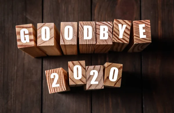 Блоки Фразой Прощай 2020 Деревянном Столе Выше Вид — стоковое фото
