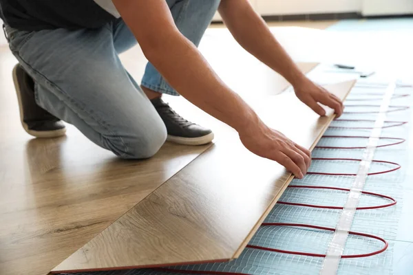 Professional Contractor Installing Underfloor Trace Heating System Indoors Closeup — Stock Photo, Image