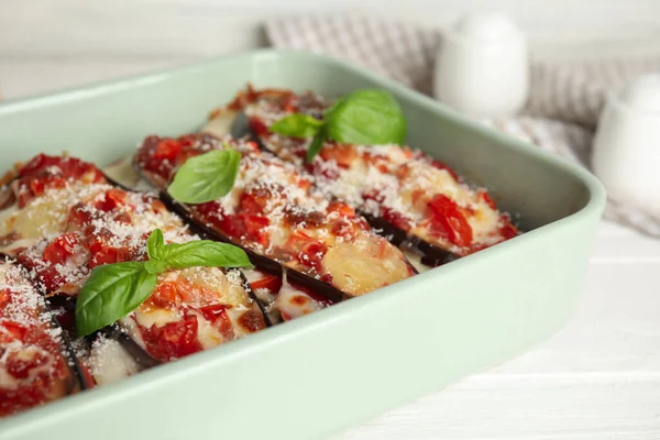 Baked Eggplant Tomatoes Cheese Basil Dishware White Table Closeup — Stock Photo, Image