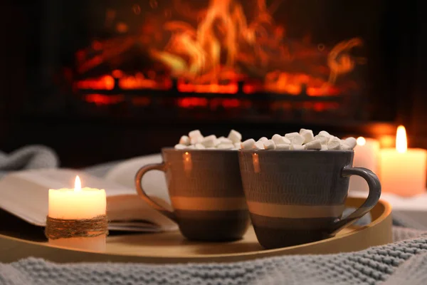 Cups Hot Drink Candle Open Book Fireplace Indoors — Stock Photo, Image