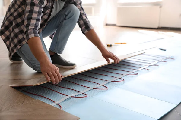 Professional Contractor Installing Underfloor Trace Heating System Indoors Closeup — Stock Photo, Image