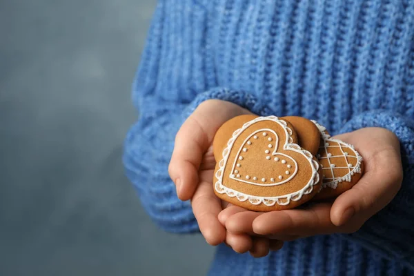 Woman Tasty Heart Shaped Gingerbread Cookies Blue Background Closeup — Stock Photo, Image