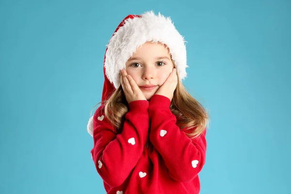 Cute Child Santa Hat Light Blue Background Christmas Celebration — Stock Photo, Image