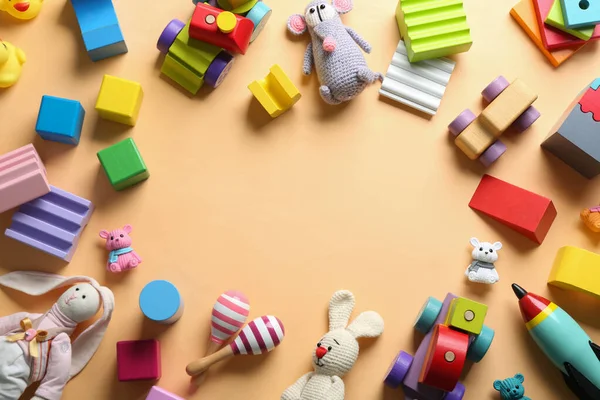 Quadro Feito Diferentes Brinquedos Fundo Bege Flat Lay Espaço Para — Fotografia de Stock