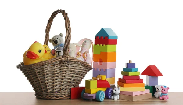 Sada Různých Hraček Dřevěném Stole Bílém Pozadí — Stock fotografie