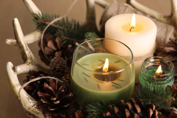 Burning Scented Conifer Candles Christmas Decor Table Closeup — Foto de Stock