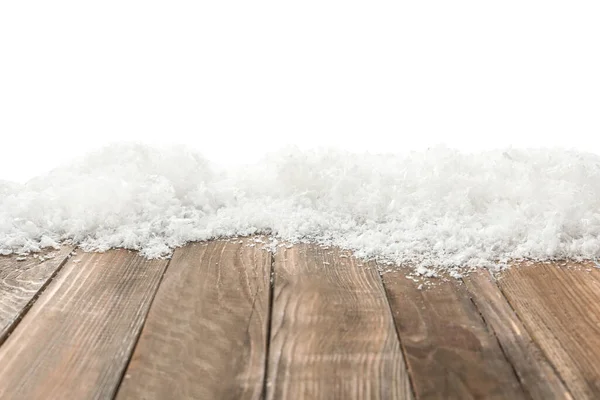 白い背景に対して木製の表面に雪 クリスマスシーズン — ストック写真