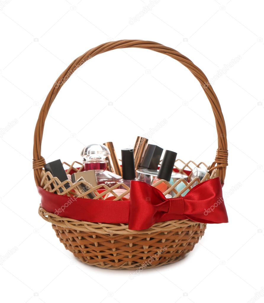 Gift set in wicker basket isolated on white