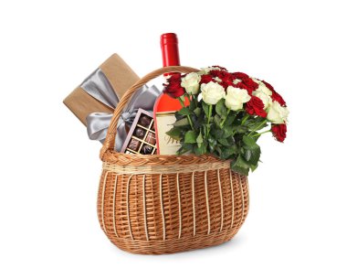 Wicker basket with gifts on white background clipart