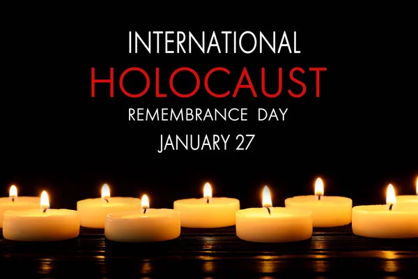 Stock image International Holocaust Remembrance Day January 27. Burning candles on black background