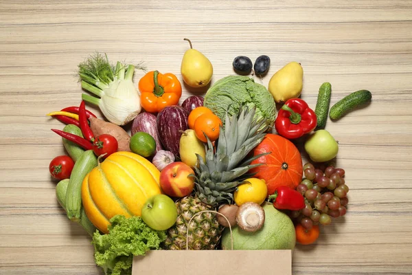 Paper Bag Assortment Fresh Organic Fruits Vegetables Wooden Table Flat — Stock Photo, Image