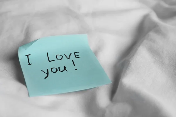 Sticky Note Phrase Love You Bed Closeup Space Text — Stock Photo, Image