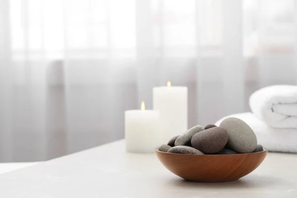 Spa Stones Wooden Bowl White Table Indoors Space Text — Stock Photo, Image