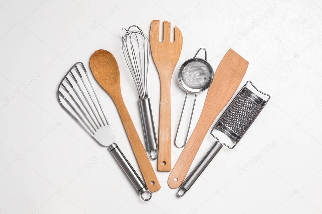 Set of cooking utensils on white background, flat lay