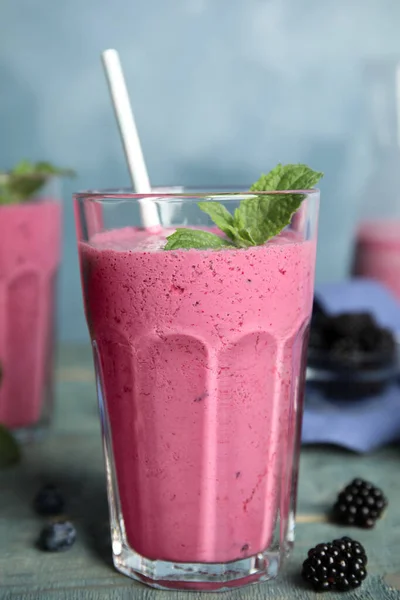 Tasty Fresh Milk Shake Berries Light Blue Wooden Table Closeup — Stock Photo, Image