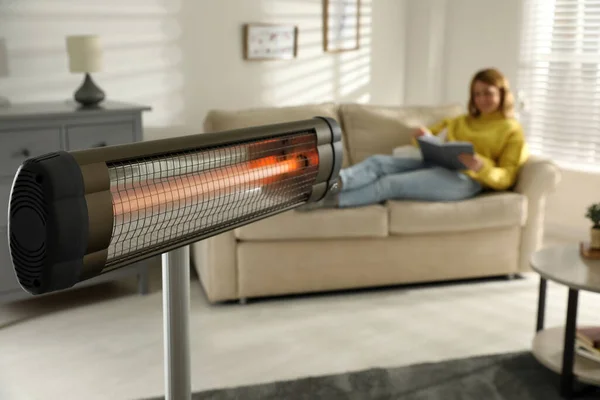 Woman Reading Book Living Room Focus Electric Infrared Heater — Stock Photo, Image