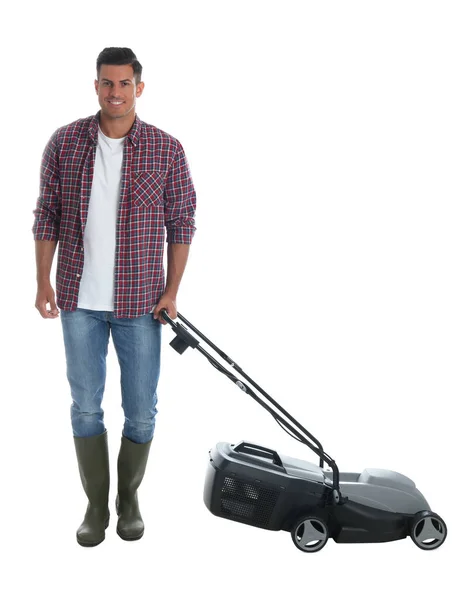白い背景に現代的な芝刈り機を持つ男 — ストック写真