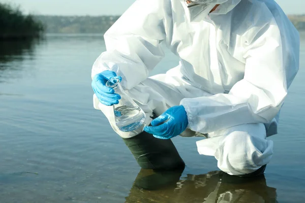 Scientist Chemical Protective Suit Conical Flask Taking Sample River Analysis — Stock Photo, Image