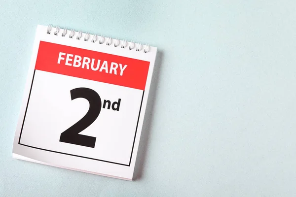 日期为2月2日的日历顶部视图 背景浅 文字空间 土拨鼠日 — 图库照片