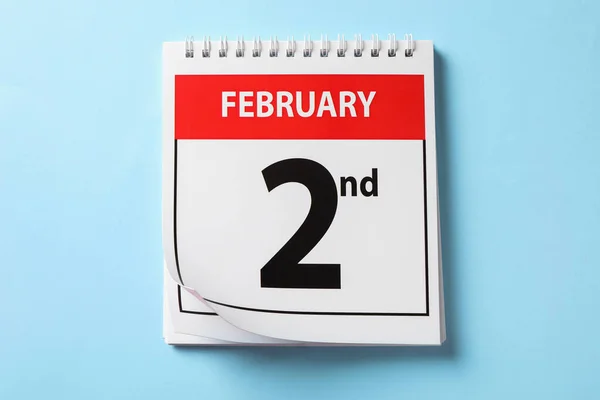 Bovenaanzicht Van Kalender Met Datum Februari Lichtblauwe Achtergrond Groundhog Dag — Stockfoto