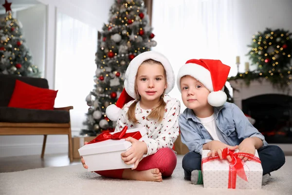 Cute Little Children Christmas Gifts Floor Home Stock Photo