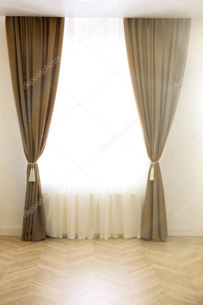 Window with elegant curtains in modern room