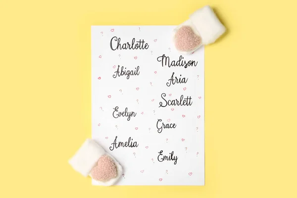 List Different Baby Names Newborn Mittens Yellow Background Flat Lay — Stock Photo, Image