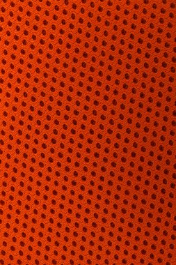 Arkaplan olarak turuncu kumaşın dokusu, üst görünüm