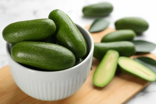 Fresh Seedless Avocados Green Leaves Wooden Board Closeup — Stock Photo, Image