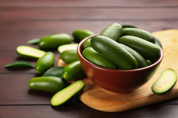 Fresh Seedless Avocados Green Leaves Wooden Table Space Text — Stock Photo, Image