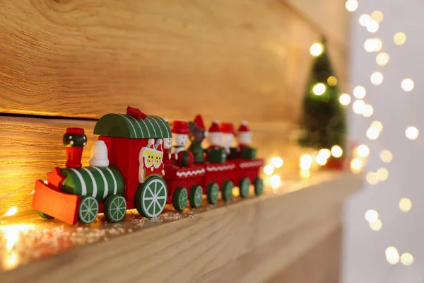 Bright Toy Train Christmas Lights Wooden Shelf Closeup Space Text — Stock Photo, Image