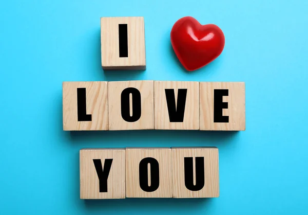 Cubes Words Love You Red Heart Light Blue Background Flat — стоковое фото