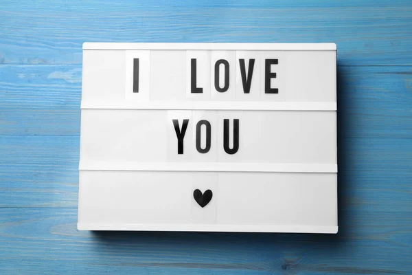 Lightbox Phrase Love You Blue Wooden Background Top View — Stock Photo, Image