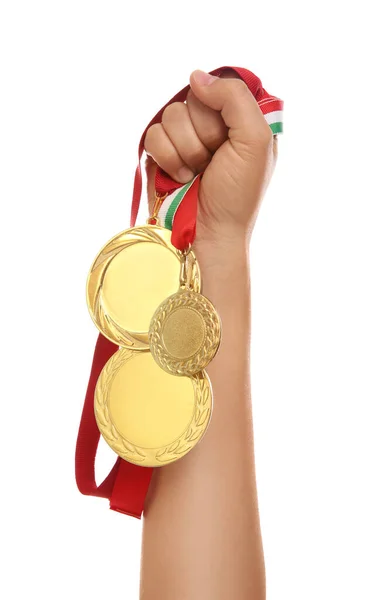 Woman Holding Gold Medals White Background Closeup — Stock Photo, Image