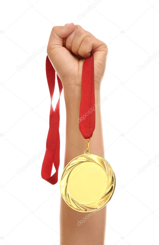 Woman holding gold medal on white background, closeup