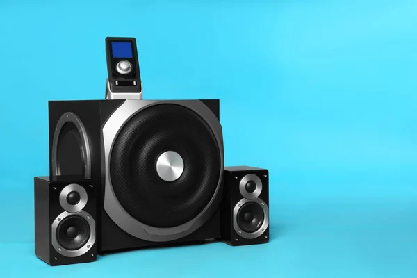 Modern Powerful Audio Speaker System Remote Light Blue Background Space — Stock Photo, Image