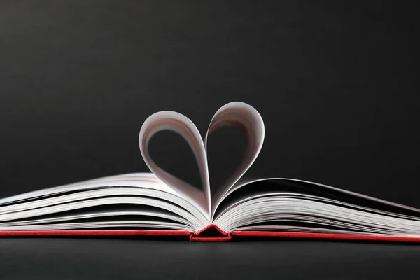 Open Book Pages Folded Heart Black Background — Stock Photo, Image