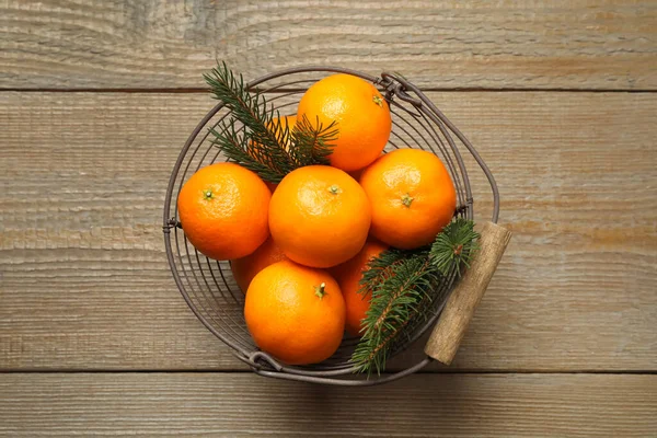 Fresh Tangerines Fir Tree Branches Metal Basket Wooden Table Top — Stock Photo, Image