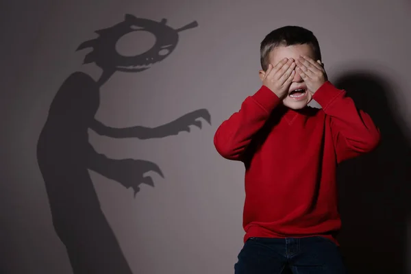 Shadow Monster Scared Little Boy Beige Background — Stock Photo, Image