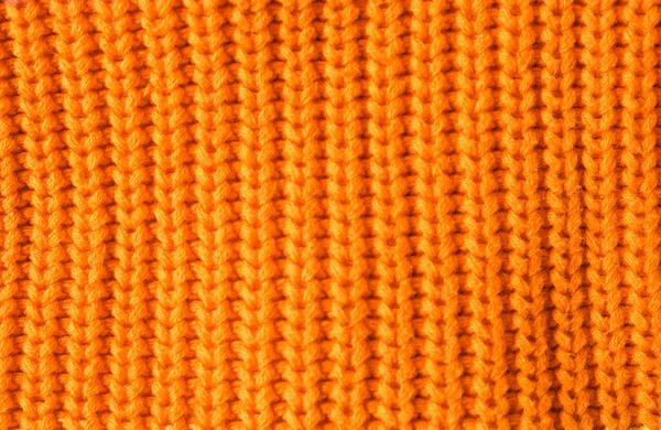 Textur Stickad Orange Tyg Som Bakgrund Närbild — Stockfoto