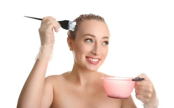 Young Woman Applying Dye Hairs White Background — Stock Photo, Image