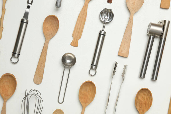 Set of cooking utensils on white background, flat lay